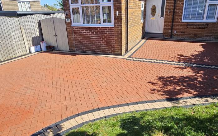 Bungalow block paving driveway after pressure washing