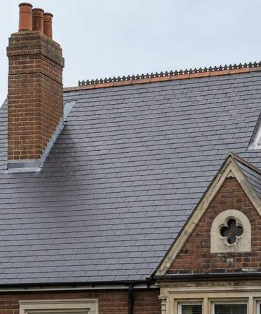 A slate roof clean and even after treatment